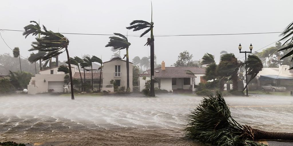 What can people in coastal areas do to prepare for hurricanes